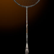 OLIVER EXTREME 69 Power Badminton Racket, grey racket with brown design and dark grey grip on a dark brown background