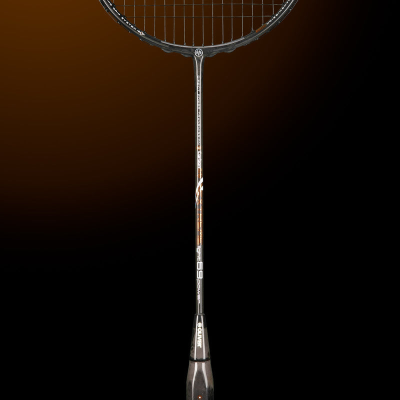 OLIVER EXTREME 69 Power Badminton Racket, grey racket with brown design and dark grey grip on a dark brown background