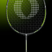 OLIVER Badminton Racket Model Fetter Smash 6, black racket with green design against a dark green background