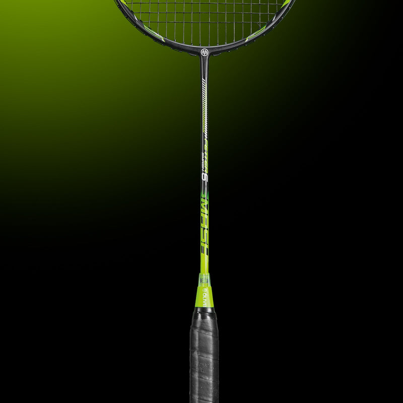 OLIVER Badminton Racket Model Fetter Smash 6, black racket with green design and black grip against a dark green background