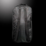 Black OLIVER pickleball bag, viewed from the back, with two shoulder straps on a black background.