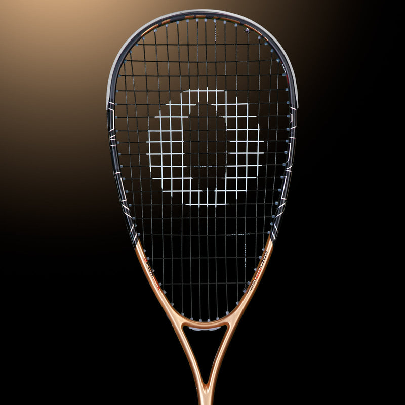 OLIVER APEX 320 CE Squash Racket, copper and black racket on a dark brown background