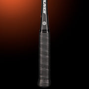 OLIVER Racer 4 Squash Racket, black grip on a dark orange background